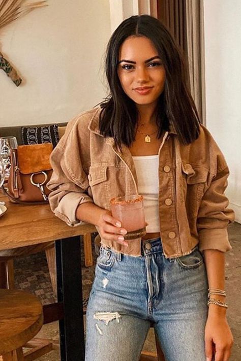 Sweet but savage in the Nobody's Baby Brown Corduroy Crop Jacket. The ideal thrown on jacket that gives that edgy cool girl vibe that we all crave. With the frayed detailing on the bottom, it's sure to cause a commotion. SIZE RECOMMENDATIONS & MATERIALS: - Oversized light brown corduroy jacket with a frayed bottom hemline. - Two front pockets. - Wear it all fall long! Great with shorts and a long sleeve or even with a bodysuit, pants, and heels. - Length 14" - 98% Cotton 2% Spandex. - Machin Cropped Jacket Outfit, Trendy Outfits 2020, Trendy Outfits Edgy, Brown Corduroy Jacket, 12th Tribe, Girl Vibe, Baby Jacket, Brown Corduroy, Corduroy Jacket