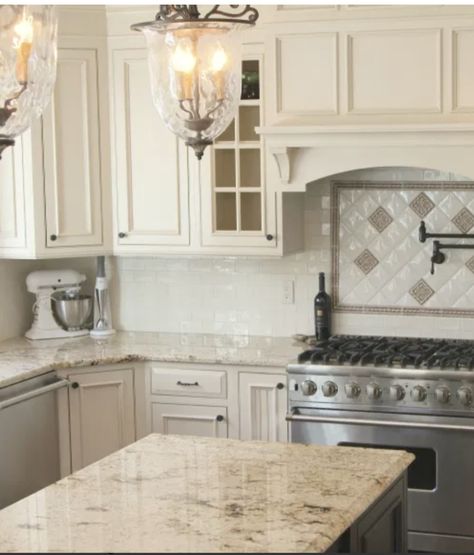 Taupe Cabinets, Warm Inviting Kitchen, Decorating Above Cabinets, Cream Colored Kitchen Cabinets, Taupe Kitchen Cabinets, Taupe Kitchen, Inviting Kitchen, Decorative Backsplash, Modular Kitchen Cabinets