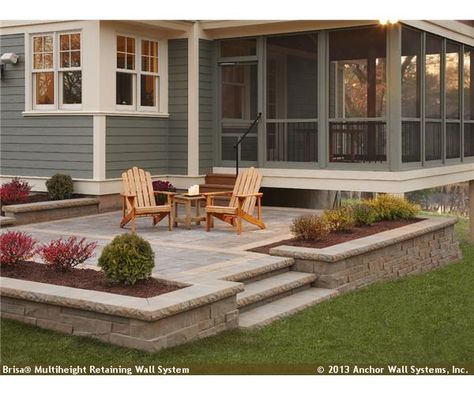 Raised patio featuring Brisa® wall system Patio Plan, Concrete Paver Patio, Raised Patio, Building A Porch, Cozy Backyard, Farmhouse Front Porches, House With Porch, Backyard Deck, Outside Living