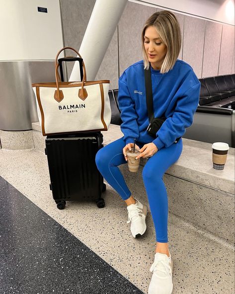 Airport outfit, airport style, matching set, cozy outfit, comfy outfit, travel style, travel outfits Bright Blue Leggings Outfit, Blue Airport Outfit, Airport Outfit Leggings, Balmain Aesthetic, Blue Leggings Outfit, Bright Leggings, Matching Sweaters, Travel Outfits, Matching Leggings