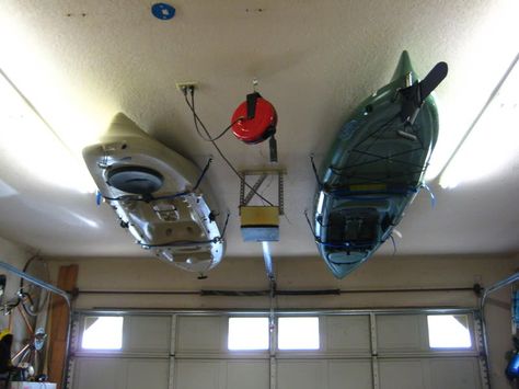 Kayak Storage - maybe one day I'll give in and hang one in my bedroom, who needs ceiling space anyways. Kayak Storage Garage, Kayak Storage Rack, Kayaking Tips, Overhead Garage Storage, Kayak Seats, Overhead Garage, Kayak Storage, Kayak Rack, Kayak Camping