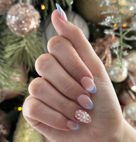 22. Delicate Blue French Tips with Snowflake Art Christmas Nails With Blue And White, Christmas Nails Simple Classy Blue, Blue Christmas French Tip Nails, Nails Idea Winter, Winter Blue French Tip Nails, Simple Christmas Nails Blue, Winter Nails Snowman, Winter Nails Blue And White, Christmas Nail Designs Blue