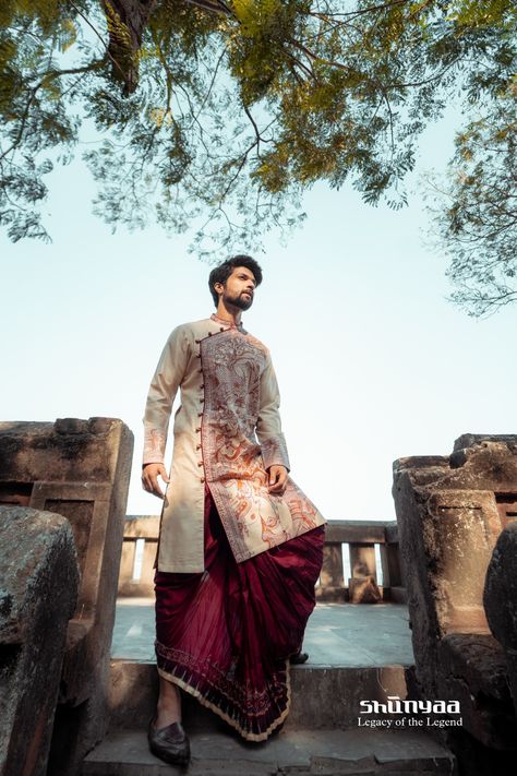 || Astitva by Shunyaa Legacy of the Legend || On Model : Tussar Angrakha style handpainted Kurta depicting Indian architecture influence in South Asia. Teamed up with Maroon embroidered Dhoti. Visit our store to experience the craftmanship of India. Join us at Shunyaa @ 7044393333 (WhatsApp/Call) Address: 38, CB Block, Sector 1, Salt Lake, Kolkata - 700064 https://maps.app.goo.gl/bC2n8q1LXh9GWQdr7 . . . #Astitva #ShunyaaSharbariDatta #SharbariDatta #Shunyaa #LegacyOfTheLegend Bengali Dhoti Kurta For Men, Bengali Groom Outfit Dhoti Panjabi, Dhoti Kurta For Groom, Bengali Groom Outfit Wedding, South Indian Reception Outfit, Bengali Groom, Kurtas Men, Indian Reception Outfit, Traditional Indian Mens Clothing