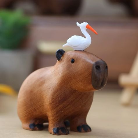 Our wood crafted #capybara ornaments are down to the last pieces. Been eyeing them? This is your chance to get them before they sell out. ~ #gift #capybaralover Playful Home, Orange Ornaments, Cute Capybara, Orange Wood, Clay Diy Projects, Nature Inspired Decor, Small Sculptures, Cute Clay, Pet Holiday