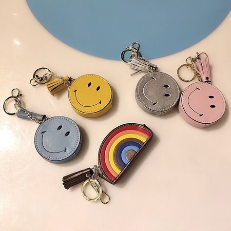 "Leather change purse key chain Trinket  purse decoration with leather tassel. High quality leather zipper pouch with key chain attachment. Decorate your purse, carry your change, or emergency cash! Rainbow: 3\" x 2.5\" x 0.5\" Happy Face: 2\" x 0.5\" Fun way to make a solid purse more exciting." Leather Change Purse, Purse Decorations, Leather Zipper Pouch, Coin Purse Keychain, Zipper Coin Purse, Leather Key Chain, Sewing Bags, Chain Purse, Canvas Messenger Bag