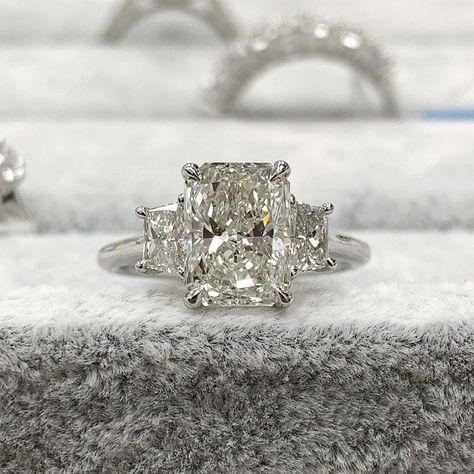 Hamra Diamonds on Instagram: “What’s better than another client who was so fortunate to get this magnificent three stone radiant and trapezoid engagement ring.....who’s…” Three Stone Engagement Rings Trapezoid, Radiant Three Stone Ring, Rich Engagement Ring, Radiant Three Stone Engagement Ring, Trapezoid Engagement Ring, Rich Jewelry, Radiant Diamond Rings, Engagement Inspo, 3 Stone Engagement Rings