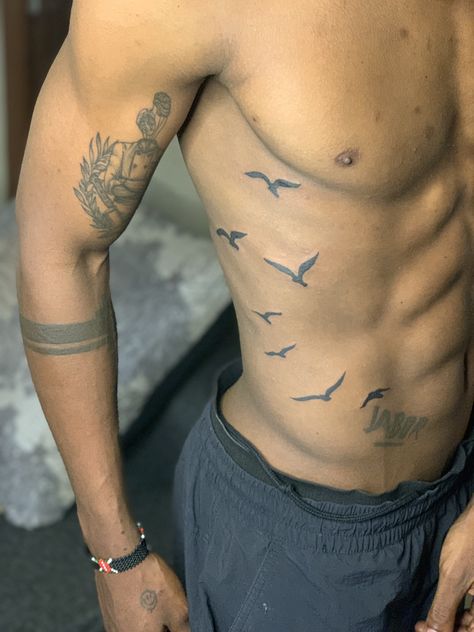 Upper Arm Bird Tattoo Men, Birds On Chest Tattoo Men, Mens V Line Tattoo, Male Tricep Tattoo, Tree Of Life Tattoo Men Chest, Birds On Ribs Tattoo Men, Minimalist Arm Tattoo, V Line Tattoos For Guys, Fine Line Tattoo Men