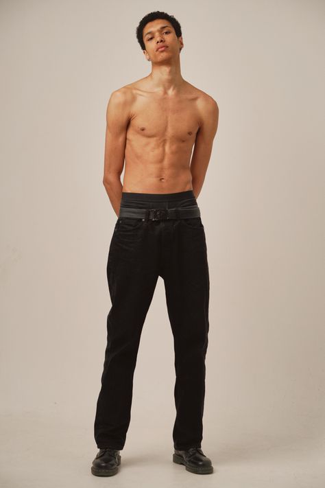 A skinny lightskin model posing in a studio for polaroids. Shirtless, wearing only a black pants and black shoes. Body Reference Real Life, Fullbody Pose References Man, Shirtless Male Model Reference, Front Poses Reference, Full Body Man Reference, Half Body Poses Men, Normal Male Body Reference, Neutral Pose Reference Male, Male Model Full Body Reference