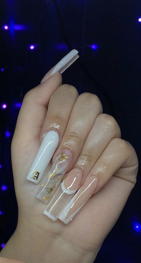 Long Nails With A Initial, L Initial Nails Acrylic, Clear Acrylic Nails With White Design, Y Initial On Nails, Acrylic Nails Initials Design, Blue Acrylic Nails Initial, Soft White Nails Acrylic Rhinestones, White Acrylic Nails Coffin With Initial, Nails With Initials Acrylic Coffin