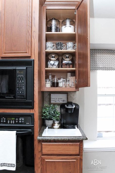 This is such a great idea! Transform a dead cabinet space with these coffee cabinet organization ideas! See more on http://ablissfulnest.com/ #coffee #coffeestation Keurig Coffee Station, Coffee Bar Ideas Kitchen Counter, Coffee Cabinet, Small Pantry Organization, Coffee Station Kitchen, Coin Café, Coffee Area, Coffee Bar Station, Coffee Stations