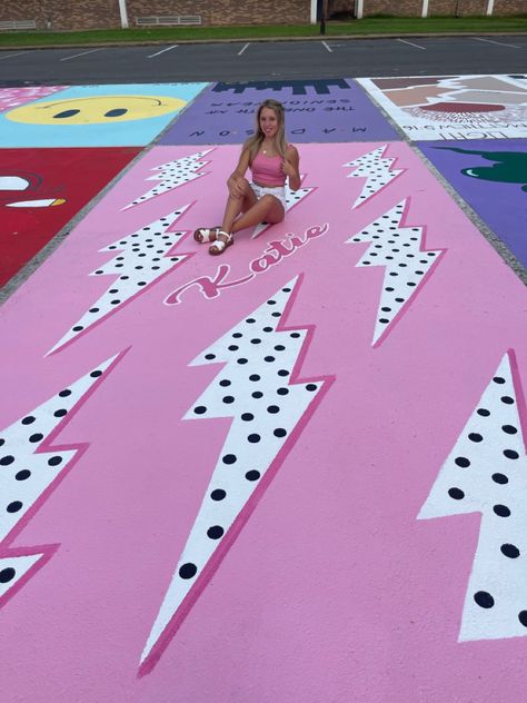 Cute Parking Spot Painting Ideas, Highschool Parking Spot Ideas, Painted Parking Spaces Ideas, Pink Mums Homecoming, Senior Year Diy, Parking Lot Painting, Senior Crown Ideas, Pink Mums, Senior Year Things