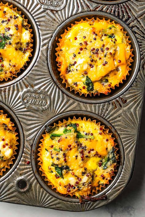 These crustless quiche muffins are savory, cheesy egg muffins baked in a muffin tin! Make them for a light breakfast, lunch, or easy snack! #quiche #muffins #breakfast Muffin Tin Crustless Quiche, Quiche Muffins Crustless, Muffin Egg Breakfast, Egg Frittata Recipes Muffin Tins, Muffin Quiche Recipes, Savory Muffins Breakfast, Mini Quiches In Muffin Tin Crustless, Mini Quiches In Muffin Tin, Baked Eggs In Muffin Tin