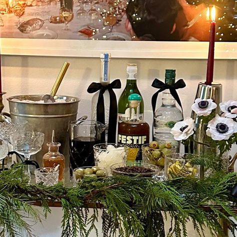 Annie Campbell on Instagram: "I love setting up a martini cart when hosting so guests can make their own cocktail! 🍸 Adding garnish options like stuffed olives, lemon twists and espresso beans are a must! Dress, shoes & bow @shopdoen Bar cart @williamssonoma" Espresso Martini Bar Set Up, Martini Bar Set Up, Cocktail Bar Set Up, Cocktail Set Up, Christmas Party Themes For Adults, Annie Campbell, Cocktail Bar Set, Stuffed Olives, Fondue Party