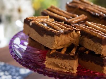 No-Bake Chocolate-Pretzel-Peanut Butter Squares Recipe | Trisha Yearwood | Food Network Chocolate Pretzel Bars, Valerie Bertinelli Recipes, Chocolate Peanut Butter Bars, Pretzel Bars, Butter Pretzels, No Bake Peanut Butter, Peanut Butter Chocolate Bars, Peanut Butter Pretzel, Banana Bites