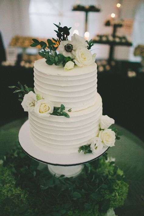 Simple two-tier wedding cake covered in real blossoms and greenery! The cake is chocolate filled with layers of marshmallow fluff and marshmallow flavoured buttercream! Wedding Cake Two Tier, Kek Kahwin, Wedding Cake Greenery, 2 Tier Wedding Cakes, Small Wedding Cakes, Fresh Flower Cake, Floral Wedding Cakes, Buttercream Wedding Cake, Wedding Cake Rustic