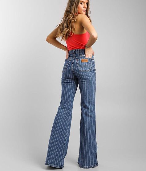 Wrangler® Wanderer High Rise Flare Jean - Blue 32/34, Women's Pinstripe Striped high rise Stretch fabric Slim through the hip and thigh 24 flared bottom opening Shoe sku 960210 Model Info: Height: 5'5 | Bust: 34 | Waist: 24 | Hip: 35 | Wearing Size: 25x34. 99% Cotton, 1% Spandex. Machine wash cold with like colors. Only non-chlorine bleach when needed. Tumble dry low or line dry. Low iron. Do not iron decoration.. WOMEN'S JEAN SIZE CONVERSION CHART Waist (size) 22 23 24 25 26 27 28 29 30 31 32 3 70s Flare Jeans Outfit, Retro Trousers, Flare Jeans Outfit, Vintage Wrangler Jeans, 70s Inspired Fashion, Cute Country Outfits, Western Jeans, Western Style Outfits, Striped Jeans