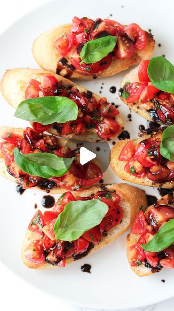 Magda Gonczaruk on Instagram: "✨Cherry Tomato and Basil Bruschetta ✨

Bruschetta is a perfect appetizer whenever you’re throwing a party or just enjoying a sunny day in the garden. Drizzled with balsamic vinegar for an extra flavour twist. So good! 🤤❤️

Full recipe is now up on my blog (link in bio)

_______
#bruschetta #bruschettarecipe #tomatorecipes #italianfood #italianrecipe #foodie #foodblogger #foodblog #foodies #recipe #videorecipe #easyrecipes #quickrecipes #yummytitbits" Throwing A Party, Bruschetta Recipe, Fancy Food, Cherry Tomato, Perfect Appetizers, Tomato Recipes, Throw A Party, Balsamic Vinegar, Quick Recipes