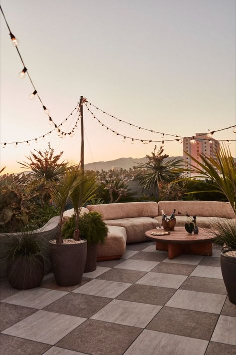 Kelly Wearstler Interiors: Hotel Design • Santa Monica Proper Rooftop Pool Deck / Bar - Walking distance to the beach, the interior design style of this luxury boutique hotel is inspired by California. This rooftop deck pool cabana features a neutral palette, organic textures and a curation of vintage furniture with an infusion of tropical landscaping. Tap the pin for more rooftop terrace design and pool landscaping ideas for your home exterior makeover. Kelly Wearstler Interiors, Terrace Tiles, Rooftop Terrace Design, Rooftop Design, Hotel Concept, Rooftop Lounge, Rooftop Patio, Rooftop Deck, Lounge Design