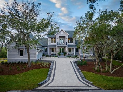 The front driveway in neutral tan stone and darker gray pavers play off the home’s gray, black and white exterior while providing plenty of room for guests to park. Gray Pavers, Front Driveway, Hgtv House, Feta Pizza, Tour Pictures, Hgtv Dream Homes, Tan Stone, Hgtv Dream Home, White Exterior