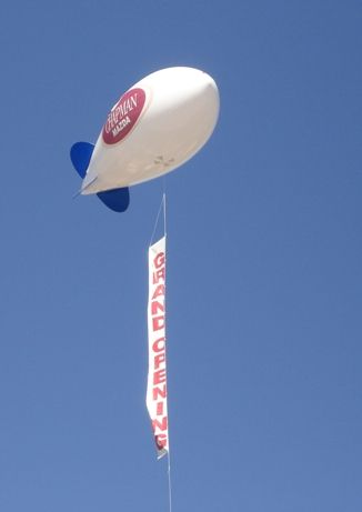 17 ft. blimp with vertical banner. We have one of the largest selections of giant advertising blimps, helium advertising balloons and blimps available for sale, service and rental. We manufacture our blimps and balloons in the USA! Halloween Usa, Inflatable Rentals, Balloon Logo, Content Advertising, Vertical Banner, Balloon Prices, Holiday Balloons, Flying Balloon, Balloon Company