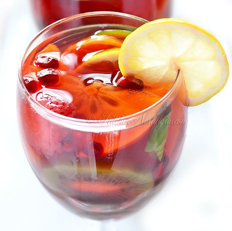 Christmas Sangria Christmas Sangria Recipes, Italian Christmas Cookie Recipes, Kitchen Nostalgia, Festive Holiday Cocktails, Christmas Sangria, Spiked Eggnog, Holiday Cocktail, Sangria Recipes, Cherry Juice