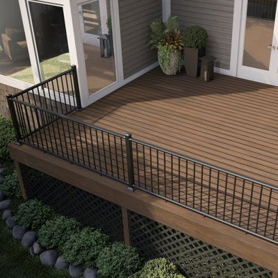 Build an outdoor railing for your deck or porch with Deckorators Classic aluminum line rail kits. Perfect for a DIYer, this kit comes with everything you need to build an 8-foot on-center rail section that’s 36 inches high when installed. The kit includes textured black aluminum top and bottom rails, matching round balusters, brackets, and hardware. To make the project easier, baluster connectors are already installed on the rails. Posts are not included. To complete your railing, use Deckorator Outdoor Railing, Aluminum Railing Deck, Deck Railing Ideas, Patio Railing, Deck Planters, Cedar Deck, Deck Colors, Railings Outdoor, Deck Railing