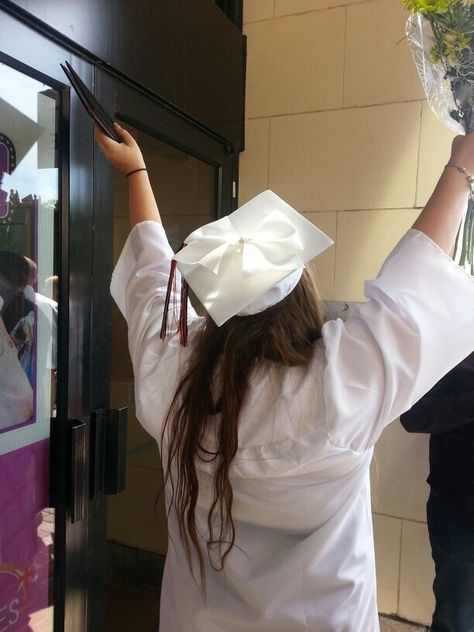 My graduation cap. A big white bow with a rhinestone center. Bow On Graduation Cap, Bow Grad Cap, Bow Graduation Cap, Graduation Cap With Bow, Graduation Cap Bow, Grad Hat, Cap Decoration, Graduation Caps, Graduation Cap Decoration