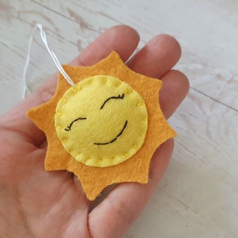 ☀️ Brighten up your day with this little ball of sunshine! 🌞 Yep, you guessed it right - I whipped up this adorable felt sun ornament all by myself, and let me tell you, it's got more personality than your average ray of sunshine! 😄 Imagine waking up to this cheery face hanging on your Christmas tree or adorning your little one's bedroom - instant mood lift guaranteed! Plus, it's handmade with love and bursting with charm, just like you! 💖 So, if you're ready to add some sunny vibes to your... Felt Sun, Desert Habitat, Sun Ornament, Desert Christmas, Sunny Vibes, All By Myself, Ray Of Sunshine, Felt Brooch, Felt Toys