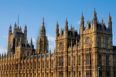 The Palace of Westminster serves as the meeting place for both the House of Commons and the House of Lords, the two houses of the Parliament of the United Kingdom. Informally known as the Houses of Parliament after its occupants, the Palace lies on the north bank of the River Thames in the City of Westminster, in central London, England. This photo captures the gleaming gold color of these buildings in the late afternoon sun and was taken from across the River Thames for an optimal vantage point House Of Parliament London, London Parliament, Westminster Palace, Houses Of Parliament London, House Of Parliament, British Parliament, Palace Of Westminster, House Of Lords, London Wall