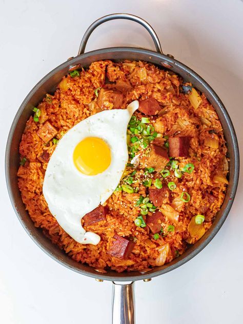 Kimchi fried rice with spam is a delicious way to use up leftover ripe kimchi and day old rice. Add fried spam and a fried egg to take this to another level! #kimchifriedrice #kimchi #koreanrecipes #drivemehungry | drivemehungry.com Fried Rice With Spam, Rice With Spam, Fried Spam, Kimchi Noodles, Easy Korean Recipes, Spam Recipes, Fermented Kimchi, Korean Dessert, Kimchi Fried Rice