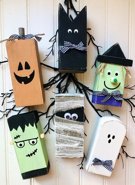 "Details This Listing is for one character - Ghost, Cat, Pumpkin, jack o lantern, Frankenstein, mummy, witch. This spooky bunch is ready to join in on the Halloween fun! The sweet and adorable side of Halloween shines through with this cuties, making it a fun decor idea for kids! Rustic and primitive yet whimsy and sweet! Description: *Icons are made of real wood, then stained and painted. Each piece is then sanded down and weathered. *Some items are adorned with buffalo check ribbon *Dimensions Wooden Frankenstein Diy, Frankenstein Wood Block, Scrap Wood Halloween Projects, Halloween Jenga Block Crafts, Jenga Block Halloween Crafts, Home Made Halloween Decorations, Wood Ghost, Wooden Halloween Decorations, Halloween Blocks