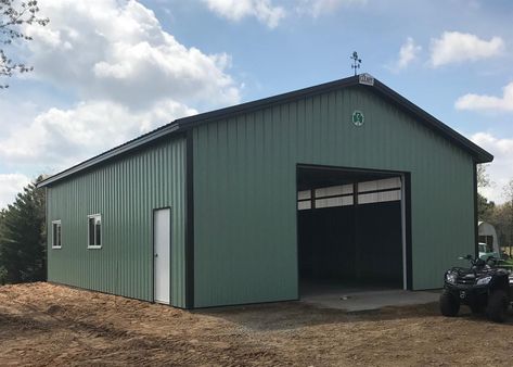 A 30' 0" x 40' 0" x 12' 4" Garage building with a Hartford Green roof, Patina Green siding and Hartford Green trim. For RICHARD/NANCY in ROSHOLT, WI (2017102054). Green Metal Building, Green Metal Siding, Black Pole Barns, Shop Remodel, Cleary Buildings, Cabin Garage, Metal Shops, Shop With Living Quarters, Green Garage