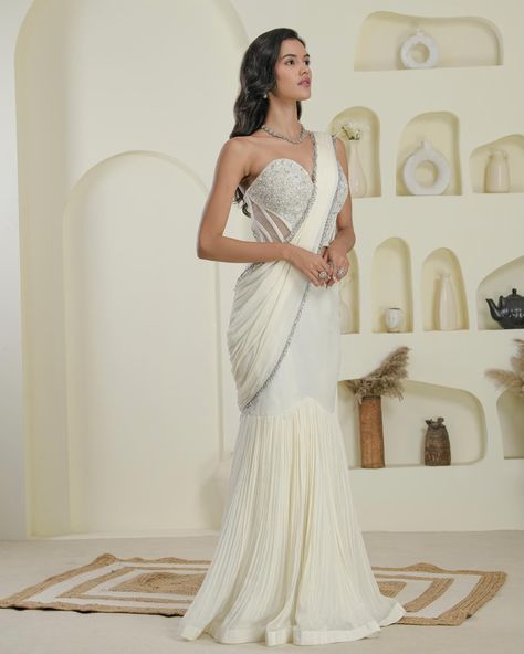 LUXE IVORY COLLECTION Make a statement with our Ivory corset fish cut drape saree. Effortlessly chic and glamorous, perfect for any special occasion. Available at HANI.S Shahpurjat Store (Appointment only) For Appointments call/whatsapp: +91-9999778004. Campaign & Outfit : @hani.s_official Muse in frame: @camiillycampos Styling: @bornalibaishya Makeup&Hair: @nikitasharmaartistry Photography: @arunvermaphotography Studio: @snapinkproductions #shahpurjat #shahpurjatmarket #shahp... Fish Cut Saree Draping, Fish Cut Saree, Fish Cut Gown, Fish Cut, Wedding Trousseau, Drape Saree, Dresses Indian, Designer Dresses Indian, Mermaid Tail