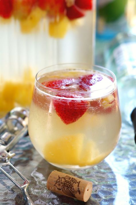 easy white sangria recipe made with moscato wine, coconut water, and fresh fruit like pineapple and strawberries Easy White Sangria, Easy White Sangria Recipe, Easy Sangria, White Wine Sangria Recipe, White Sangria Recipe, Easy Sangria Recipes, What Is Healthy Food, Wine Sangria, Moscato Wine