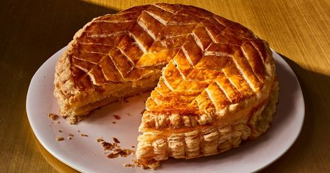 A galette des rois is as much a game as a dessert, and the winner gets to wear a crown. Galette Des Rois Recipe, French Tart, Nyt Cooking, Almond Cream, Puff Pastry Recipes, Pastry Recipes, Food Magazine, Party Game, What To Cook