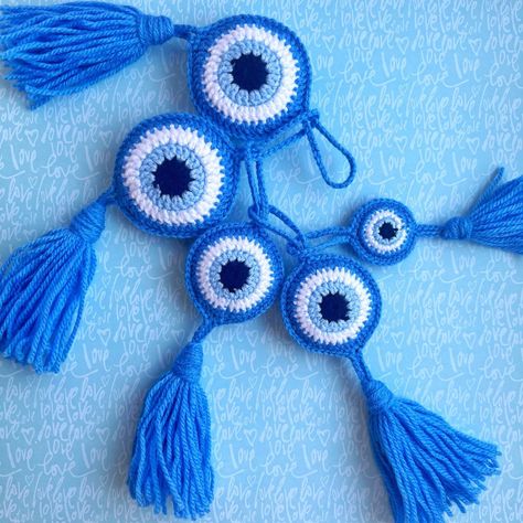 Evil eye. Crochet keychain. Evil Eye Crochet Keychain, Crochet Evil Eye, Eye Crochet, Wall Hanging Crochet, Yellow Minion, Tassel Wall Hanging, Minion Toy, Evil Eye Wall Hanging, Tassel Wall