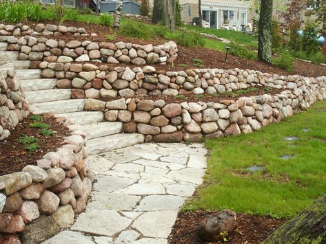 Terraced Fieldstone Retaining Walls in Mequon, Wisconsin Diy Stone Retaining Wall, Fieldstone Wall, Wall Seat, Stone Wall Backdrop, Diy Stone Wall, Natural Stone Retaining Wall, Affordable Landscaping, Retaining Wall Ideas, Boulder Retaining Wall