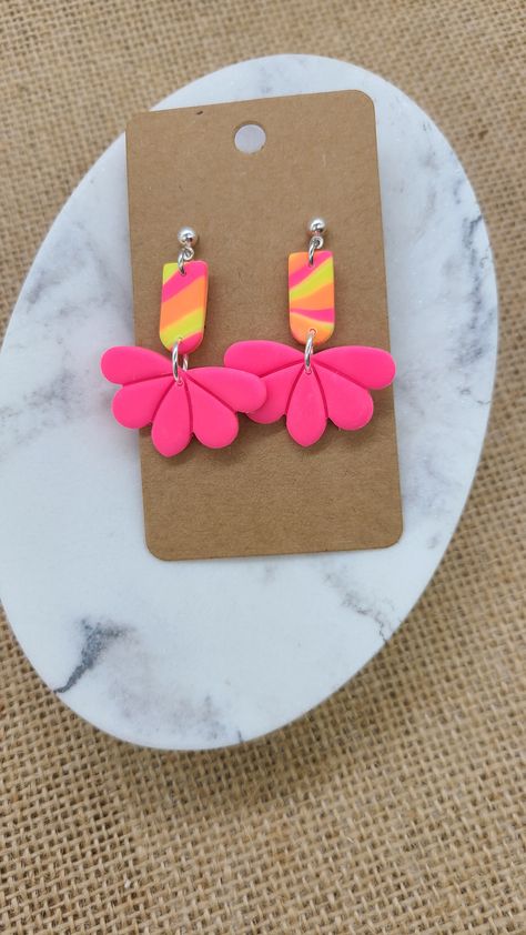 Handmade out of clay. These are neon tiki tie dye earrings. So cool for Summer. Bright Polymer Clay Earrings, Bright Clay Earrings, Tie Dye Clay Earrings, Neon Clay Earrings, Cherry Ideas, Tropical Clay Earrings, Neon Polymer Clay Earrings, Flower Clay Earrings, Cool For Summer