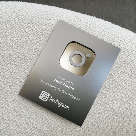 Customized Silver Instagram Plaque - Personalized Social Media Achievement  Award It's time to display your success on your wall with Instagram plaques! These plaques will help you revive your memories by bringing your Instagram experience to your living spaces. Order now these specially designed personalized plaques that match the decor of your home or workplace and immortalize your achievement. Plaque Features: - Personal Touch: Personalize your plaque and make it even more special by adding your Instagram username and a special message. - High Quality: Made from durable and long-lasting material, the plaque allows you to showcase your success with confidence. - Aesthetic Design: Carefully designed to fit the Instagram theme, the  plaque creates an eye-catching decorative element on your Acrylic Signage Design, Instagram Plaque, Confidence Aesthetic, Donor Signage, Internal Comms, Commemorative Plaque, Instagram Username, Instagram Wall, Plaque Design