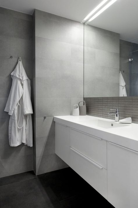 E2 Apartment by Tchenguelieva Staynov Architects Bathroom With Light Grey Tiles, Bathroom Light Grey Tiles, Light Grey Bathroom Ideas Modern, Light Grey Modern Bathroom, Chrome Tapware Bathroom, Grey And Chrome Bathroom, Grey And Marble Bathroom, Light Grey And White Bathroom, Light Grey Marble Bathroom