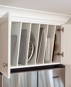 Cookie sheet and baking pan organizer above the fridge! Over The Fridge Storage, Over The Fridge, Kitchens Designs, Refrigerator Cabinet, Cookie Sheets, Fridge Storage, Classic Kitchens, Transitional Kitchen, Kitchen Remodel Idea