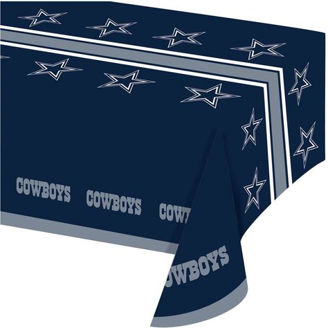 Keep the game day fun at a maximum and messes at a minimum with the Dallas Cowboys Table Cover. Measuring 54" x 102", this tablecloth features the Cowboys logo across the center, "Cowboys" repeated along the edges, and a blue background. Sold in packs of 3, this table protector will add a festive football atmosphere and make clean-up a breeze. Dallas Cowboys Birthday Party, Dallas Cowboys Theme, Dallas Cowboys Birthday, Dallas Cowboys Party, Team Table, Dallas Cowboys Game, Cowboy Games, Cowboy Birthday Party, Banquet Table