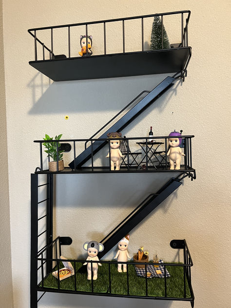 You can't tell me this isn't the cutest thing ever! The shelf and little accessories are linked below! Fire Escape Decor, Fire Escape Shelf, Staircase Shelves, Figures Display, Pinterest Room, Living Room Transformation, Bored Board, Unique Shelves, Floating Staircase