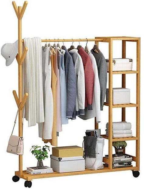 (paid link) We rounded taking place our favorites under that will have you embracing the closet-free life. LOW-PRICED GARMENT RACKS. Diy Clothes Rack Wood, Poptun, Clothes Rack Aesthetic, Wooden Clothes Rack, Clothing Rack Bedroom, Drying Stand, Diy Clothes Rack, Clothes Drying, Rack Design