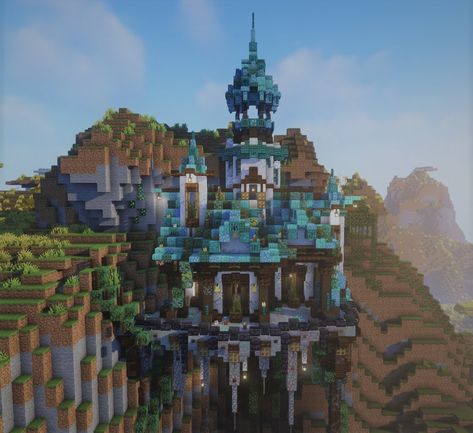 blue and white hilltop temple castle minecrafy build Aesthetic Fantasy Minecraft Houses, Minecraft Building Aesthetic, Magical Minecraft Houses, Minecraft Building Ideas Fantasy House, Minecraft Entrances, Minecraft Mythical Builds, Minecraft Building Ideas Mountain, Hanging House Minecraft, Minecraft Mystical Builds