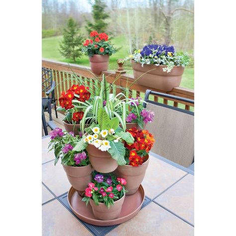 Dollar Tree Stackable Planters, Indoor Plant Display Ideas, Tower Planter, Stackable Planters, Indoor Plant Display, Plant Display Ideas, Planters Ideas, Tiered Planter, Patio Flowers