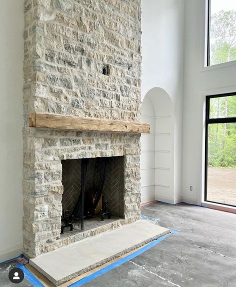 Cobblestone Fireplace Ideas, Heavy Mortar Stone Fireplace, Fireplace With Deer Mount, Limestone Hearth Fireplace, Stone Fireplace No Hearth, Amber Interiors Fireplace, Simple Stone Fireplace, Overgrouted Stone Fireplace, German Schmear Stone Fireplace