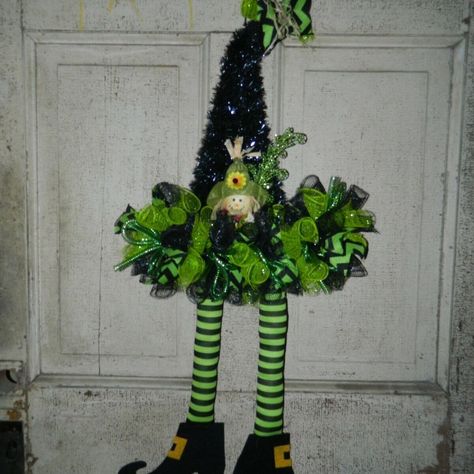 Handmade Halloween Witch Hat Door Dcor This One Is Made Of Black Tinsel Background With Green And Black Deco Mesh. Accented With Chevron Ribbons And More. Has A Scarecrow Head On The Front This Wreath Measures Approx. 17" Across The Skirt Part And From The Top To The Bottom Is 32" This Listing Is For One With Legs I Am Only Listing One At This Time, But I Can Make More. Please Know That It Is Handmade And You Will Be Getting The One That Is Pictured. Tinsel Background, Fall Green, Halloween Deco Mesh, Shawnee Pottery, Scarecrow Wreath, Halloween Witch Hat, Flower Video, Chenille Stems, Halloween Deco