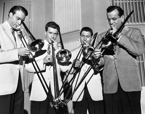 Glenn Miller Orchestra trombones Glenn Miller Aesthetic, Glenn Miller Orchestra, Hampton Social, 40s Music, Glen Miller, 1940's Fashion, Glenn Miller, Spotify Covers, Happy Hippie