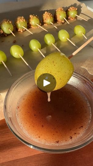 230K views · 29K reactions | Candy Apple Grapes 🍇🍏

The perfect snack for fall!

You’ll need:
grapes
½ cup condensed coconut milk (can also use regular condensed milk)
1 tsp apple pie spice
crushed graham crackers (or crushed nuts)

1. Wash your grapes and make sure they are completely dry. Keep them refrigerated while you prepare the next step.
2. Combine your condensed coconut milk with apple pie spice. If your condensed milk isn’t smooth when you open it, heat it up in a small pot over the stove and stir continuously until it melts down to a creamy texture.
3. Insert a toothpick into the grape.
4. Dip the grape into the mixture.
5. Let the excess drip off and then coat the grape in crushed graham crackers.
6. Chill in the freezer for about 10 minutes and enjoy! (You can also enjoy the Grape Salad Recipe, Condensed Coconut Milk, Fruit Appetizers, Fruit Creations, Grape Recipes, Wine And Cheese Party, Apple Pie Spice, Charcuterie Inspiration, Classic Candy